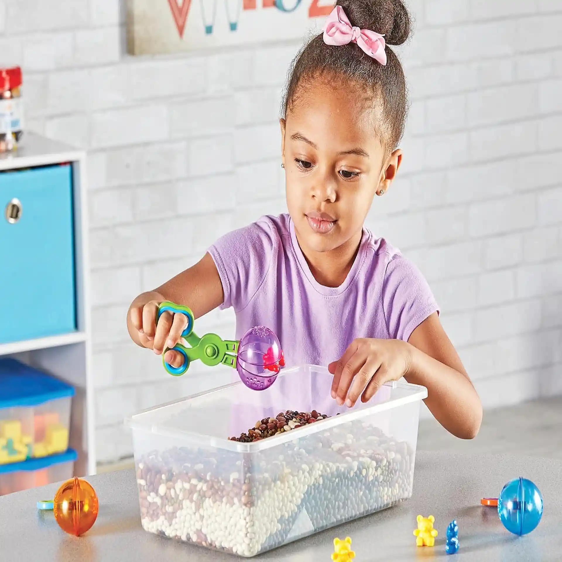 مَلْقَط/مِغْرَفَة تدريبية (Handy Scoopers)