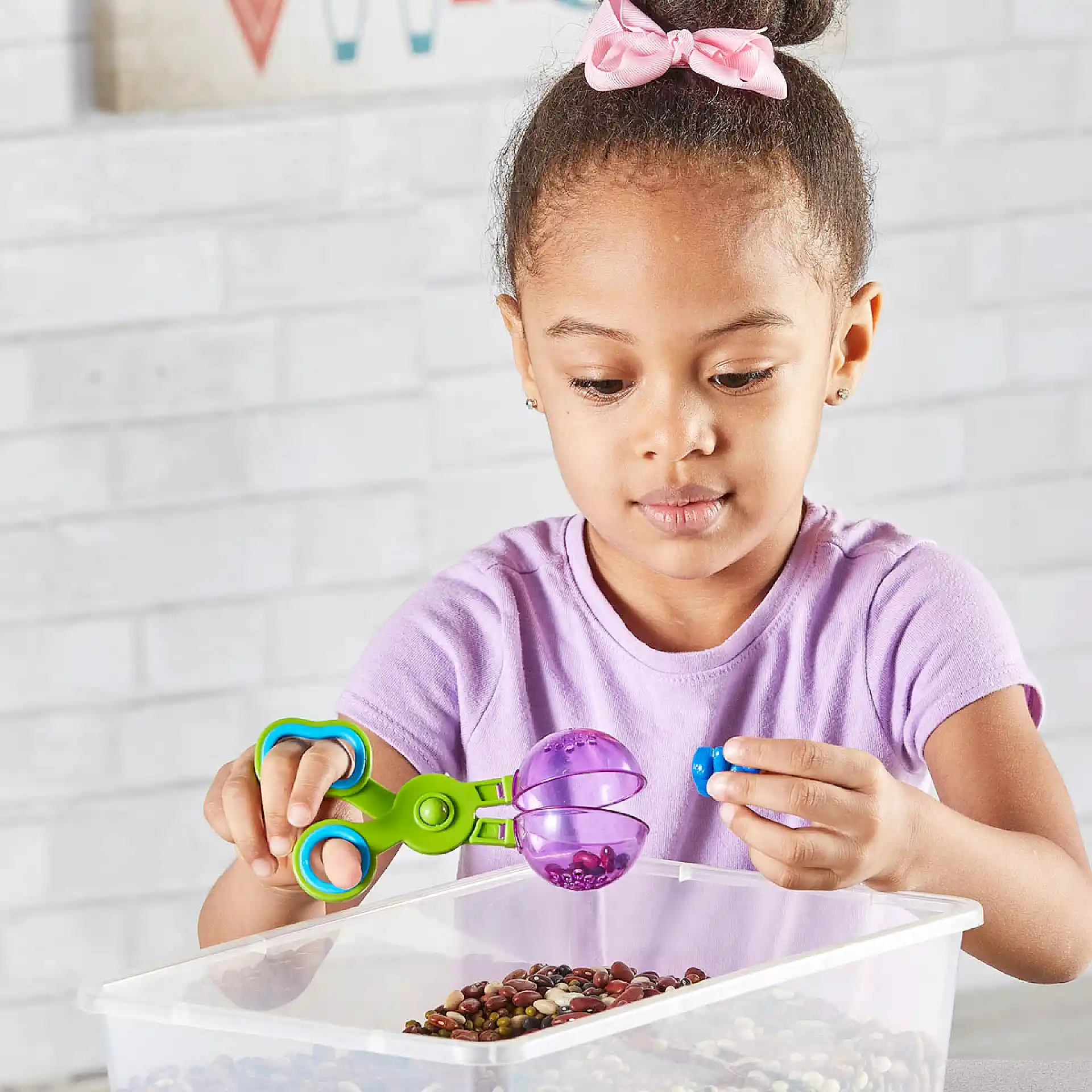 مَلْقَط/مِغْرَفَة تدريبية (Handy Scoopers)